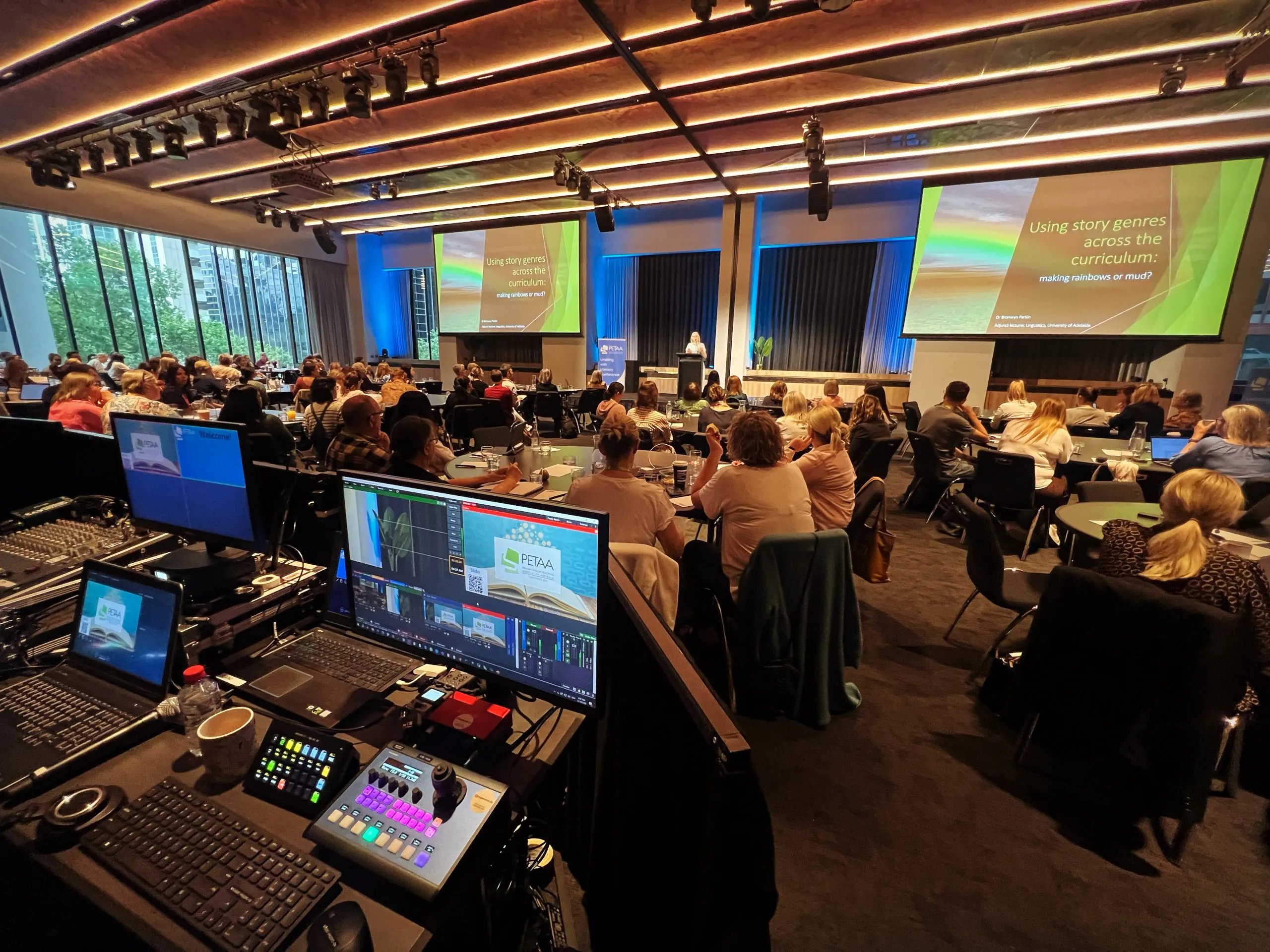 Corporate conference audience and screens